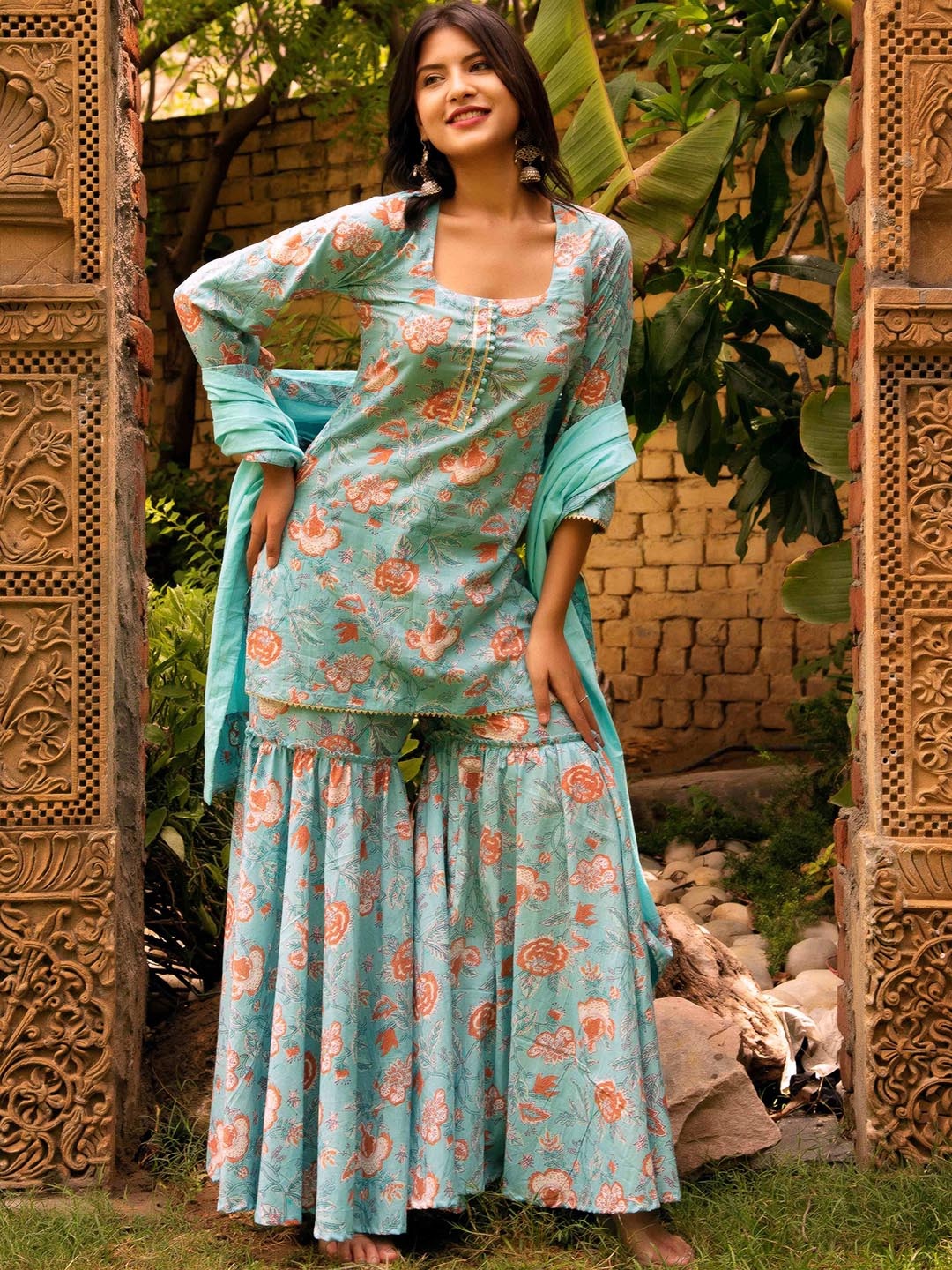

Pomcha Women Floral Printed Gotta Patti Pure Cotton Kurti With Sharara And Dupatta, Blue