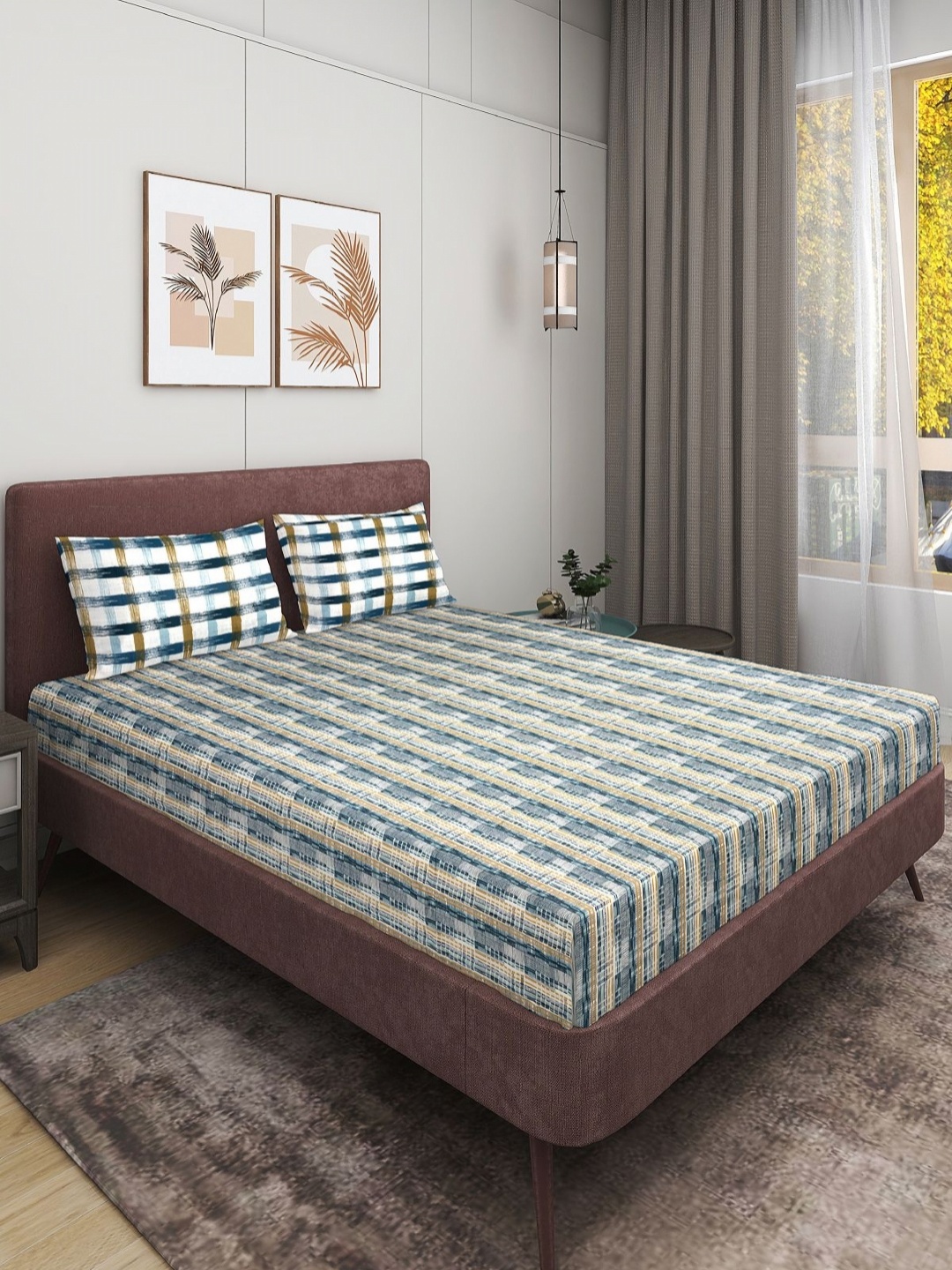 

Aura Blue And White Printed 210 TC King Bedsheet Set 2.54 m X 2.74 m