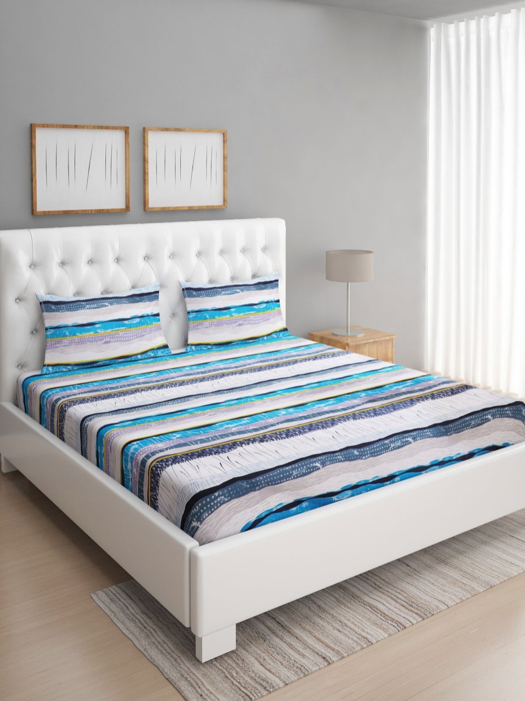 

Aura Blue & Off White Abstract 160 TC Queen Bedsheet with 2 Pillow Covers