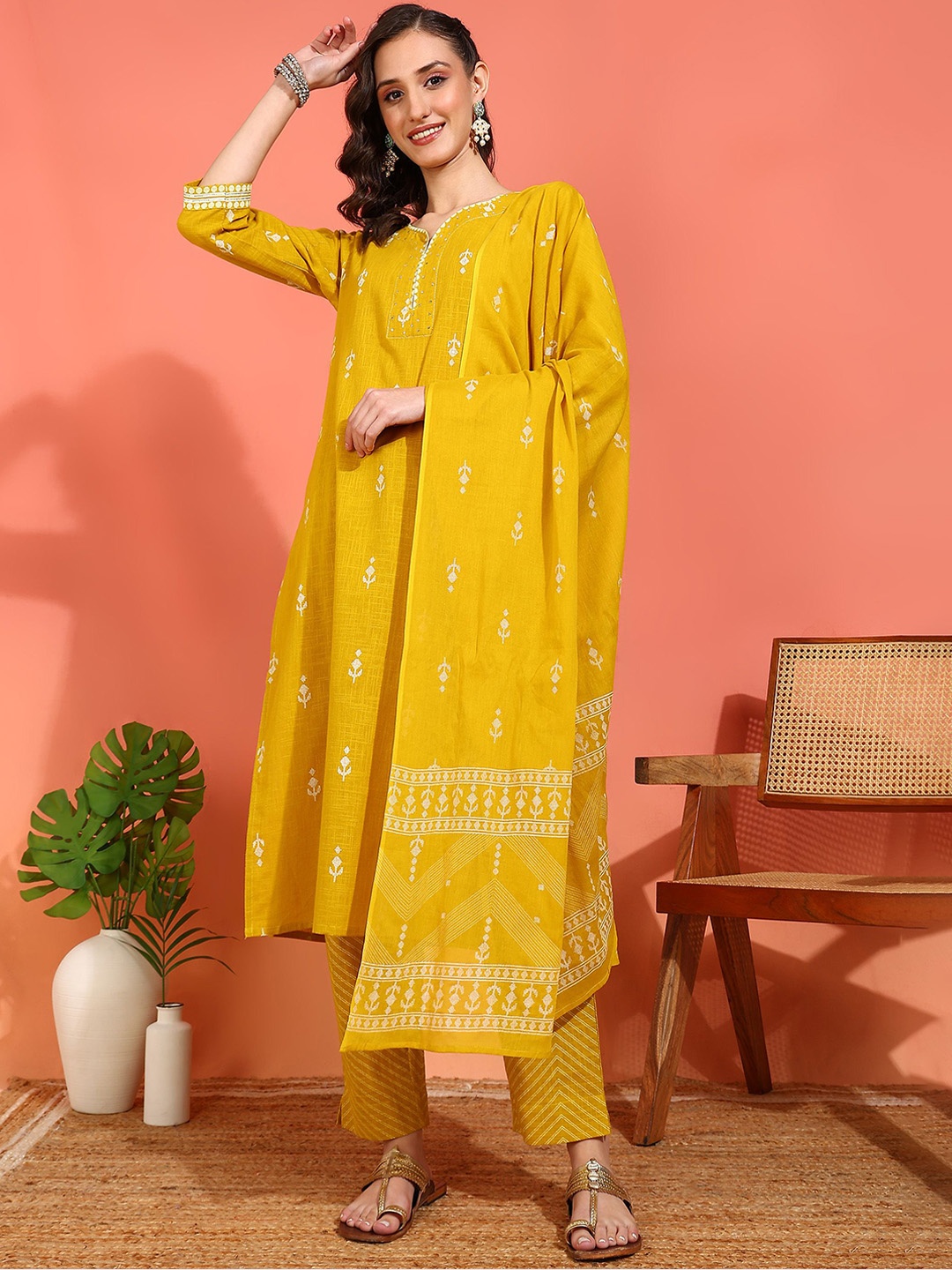 

IKRASS Floral Printed V Neck Sequinnce Work Kurta With Trousers & Dupatta, Mustard