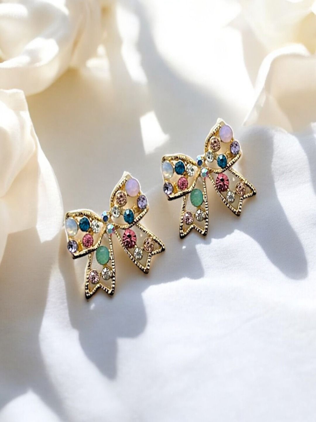 

AccessHer Gold-Plated Artificial Stone Studded Contemparory Shaped Studs