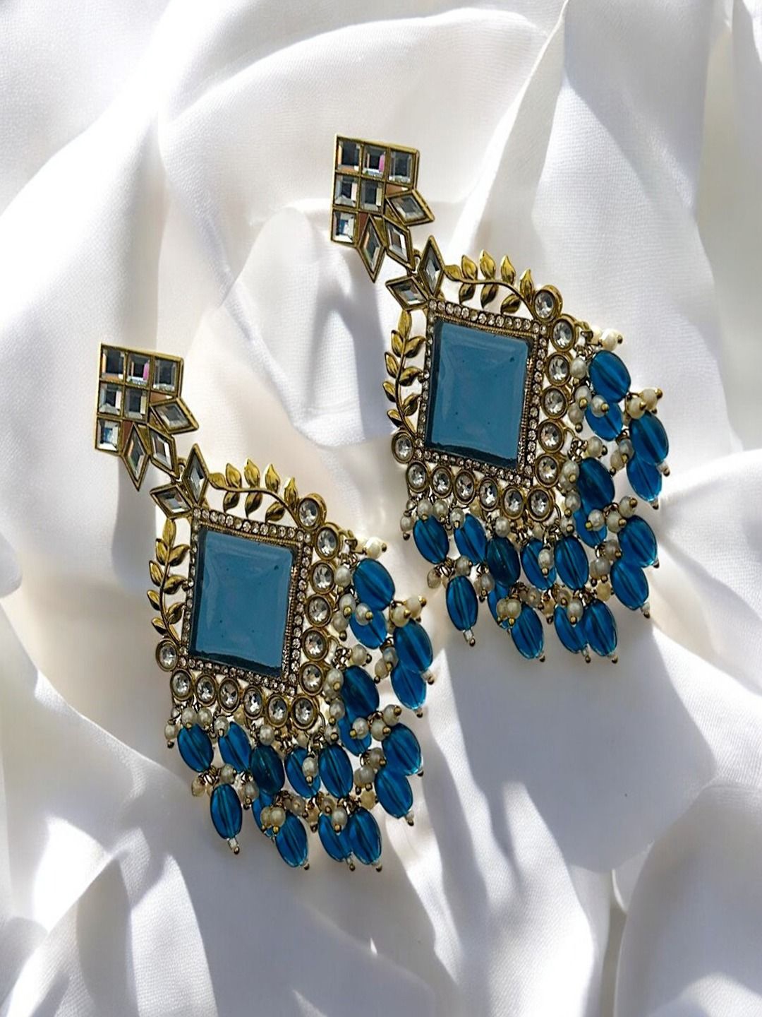 

AccessHer Brass-Plated Artificial Stones Studded And Beaded Geometric Shaped Drop Earrings, Blue