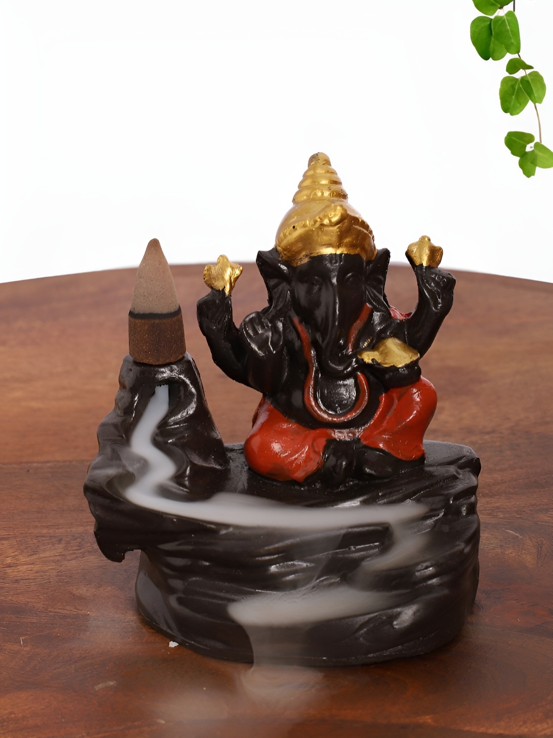 

INTERNATIONAL GIFT Orange Religious Idol Showpiece
