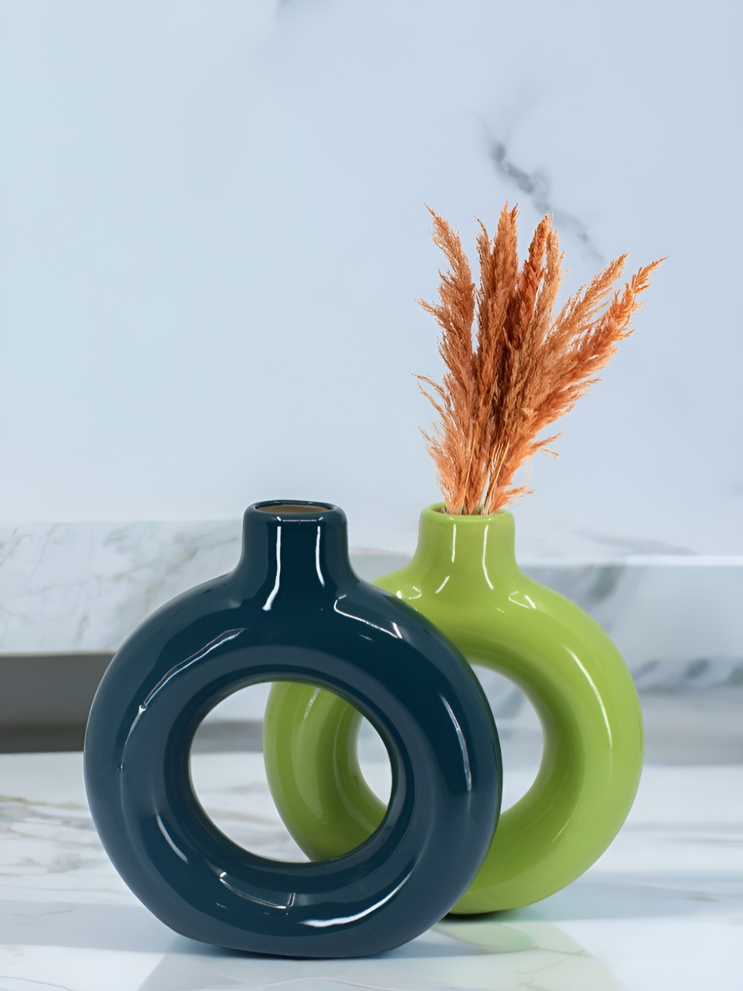 

The Decor Lane 2-Pcs Green & Teal Green Ceramic Donut Vase