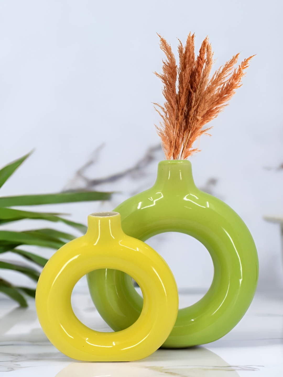 

The Decor Lane 2-Pcs Green & Yellow Ceramic Donut Vase