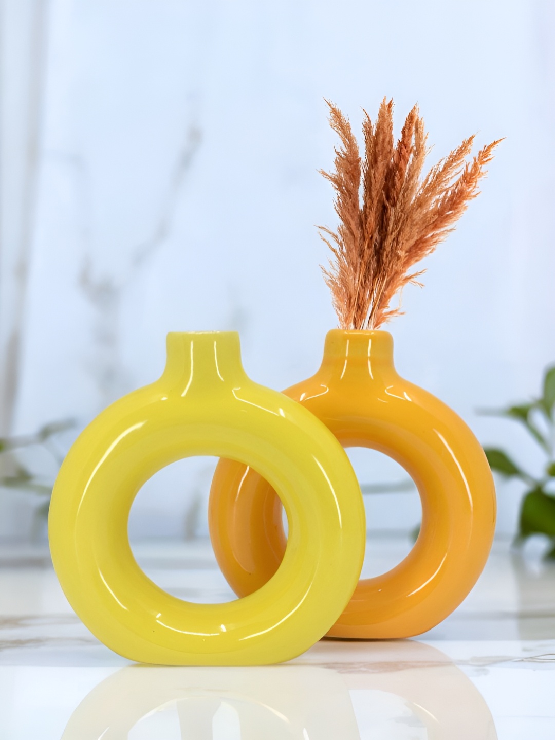 

The Decor Lane 2-Pcs Yellow & Orange-Colored Ceramic Donut Vase