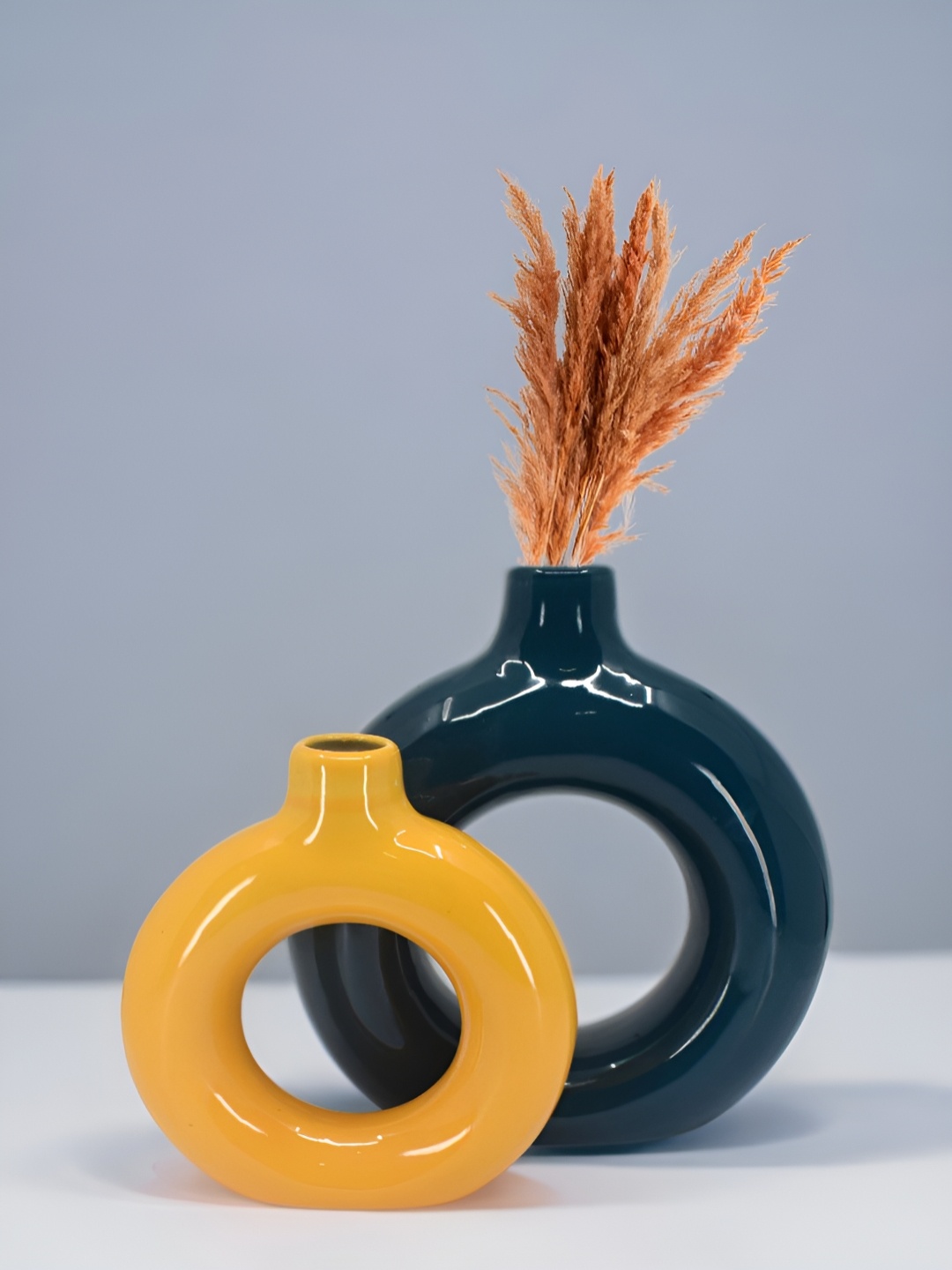 

The Decor Lane 2-Pcs Blue & Orange-Colored Ceramic Donut Vase