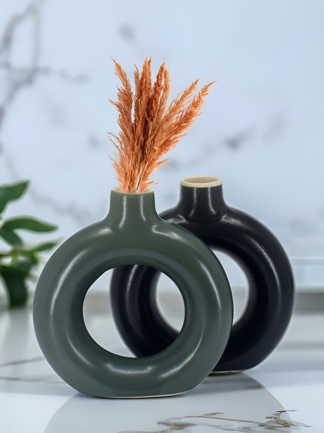 

The Decor Lane 2-Pcs Green & Black Ceramic Donut Vase