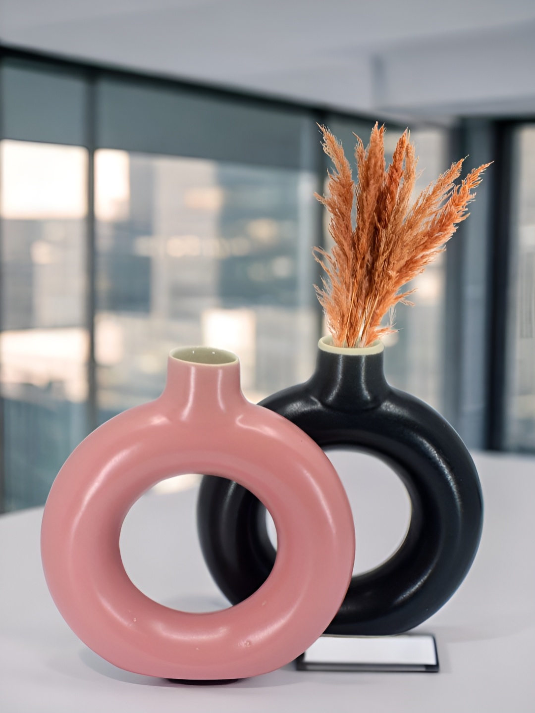 

The Decor Lane 2-Pcs Peach-Colored & Black Ceramic Donut Vase