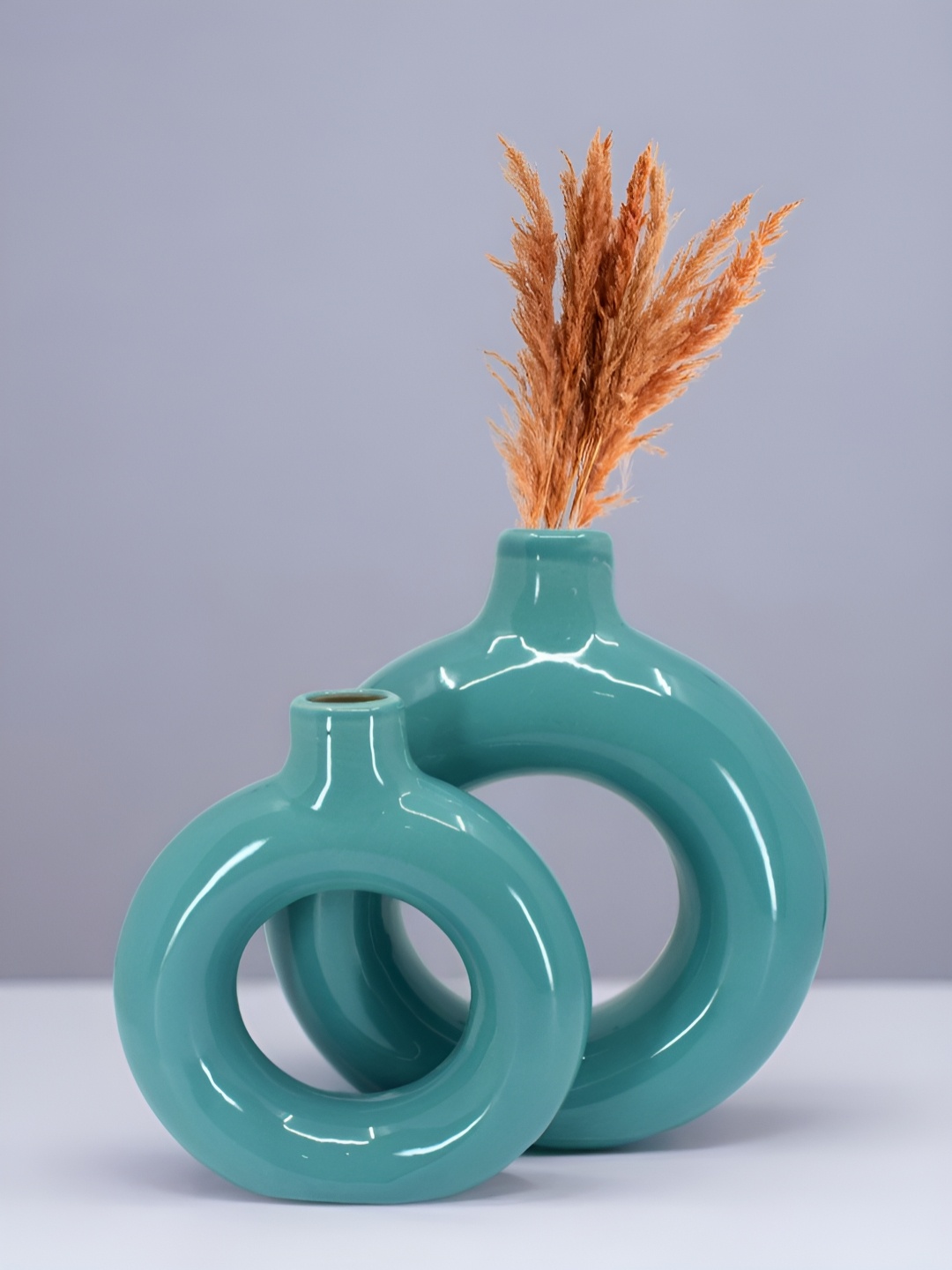 

The Decor Lane 2-Pcs Teal Blue Ceramic Donut Vase