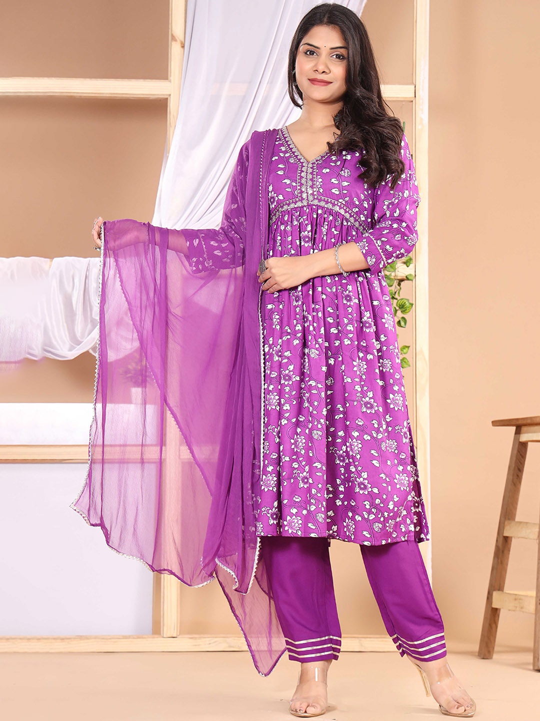 

Women Planet Floral Printed Thread Work V-Neck A-Line Kurta with Trousers And Dupatta, Purple