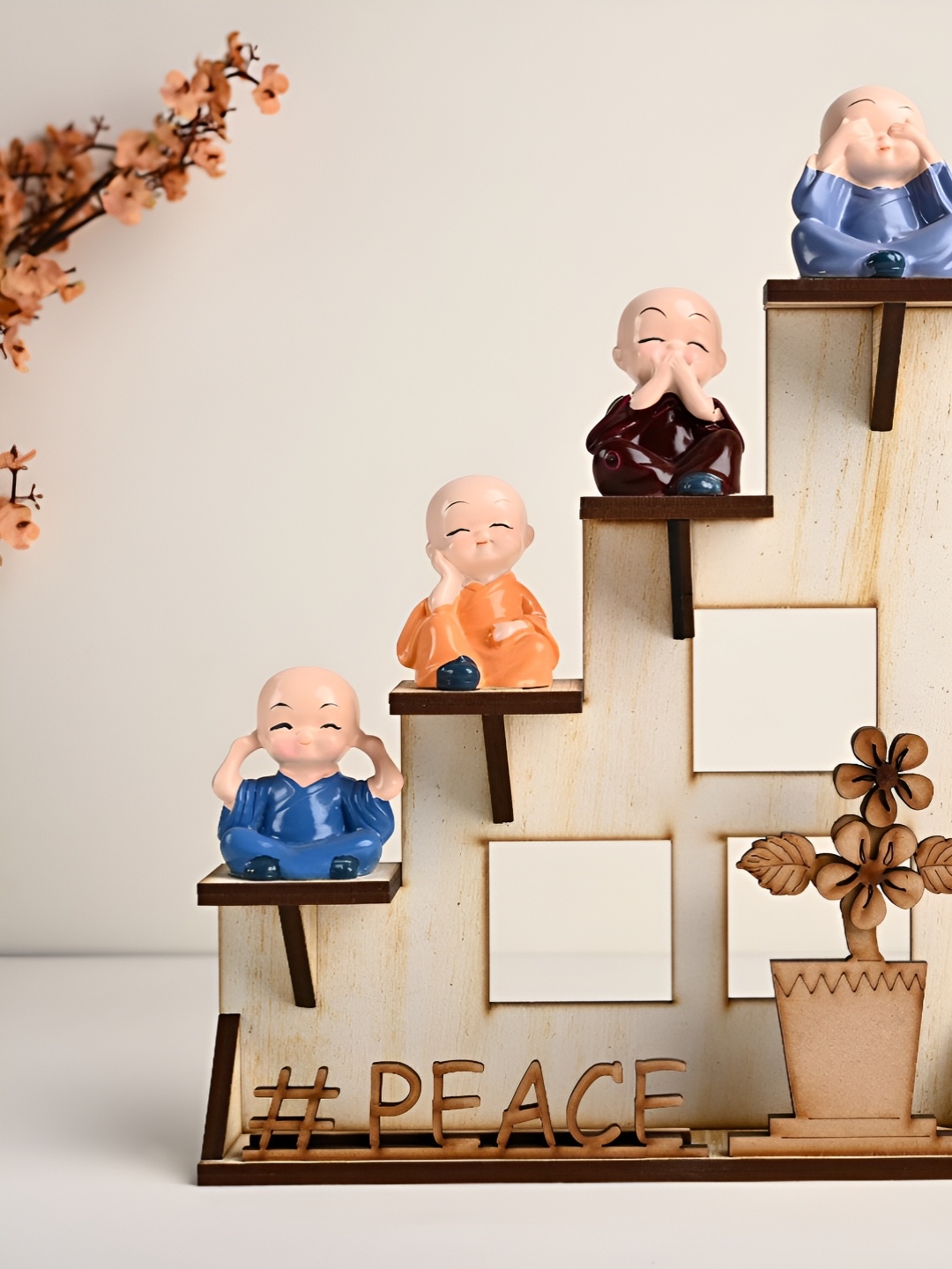 

Floweraura Brown Set Of 4 Buddha Monks Idol Showpiece