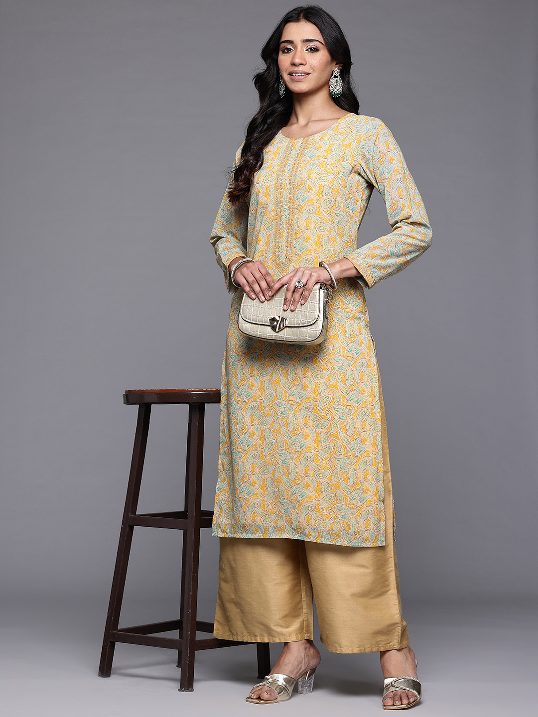 

Ahalyaa Paisley Printed Thread Work Georgette Kurta, Mustard