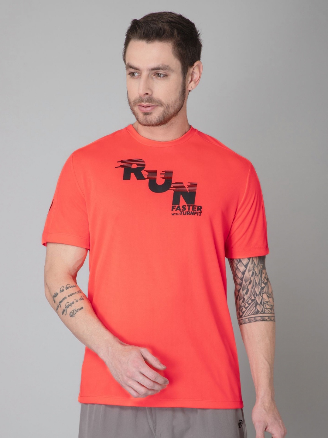 

TURNFIT Men Typography Printed Moisture Wicking Applique T-shirt, Orange