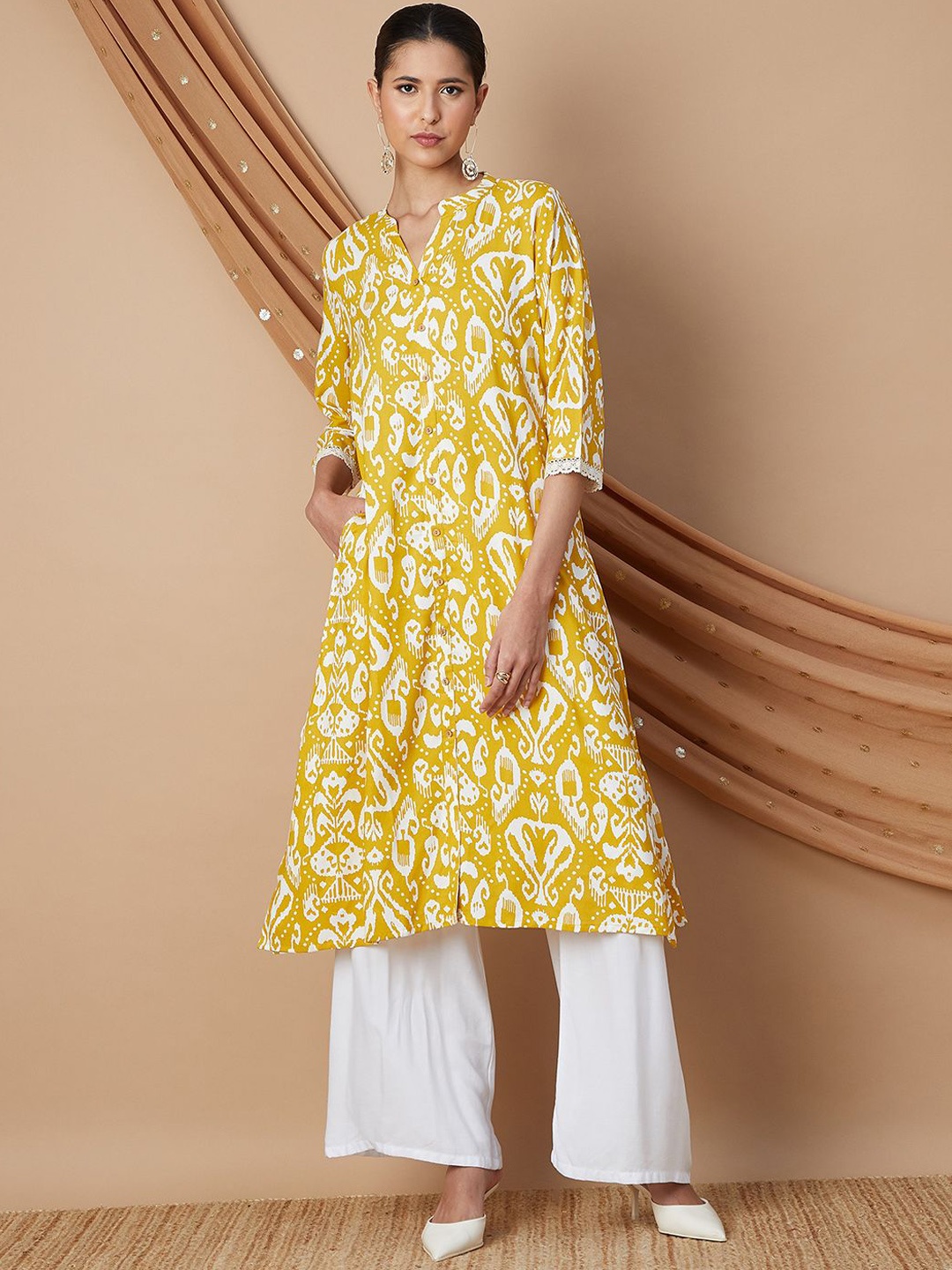 

Melange by Lifestyle Paisley Printed High Slit Mandarin Collar A-Line Kurta, Mustard