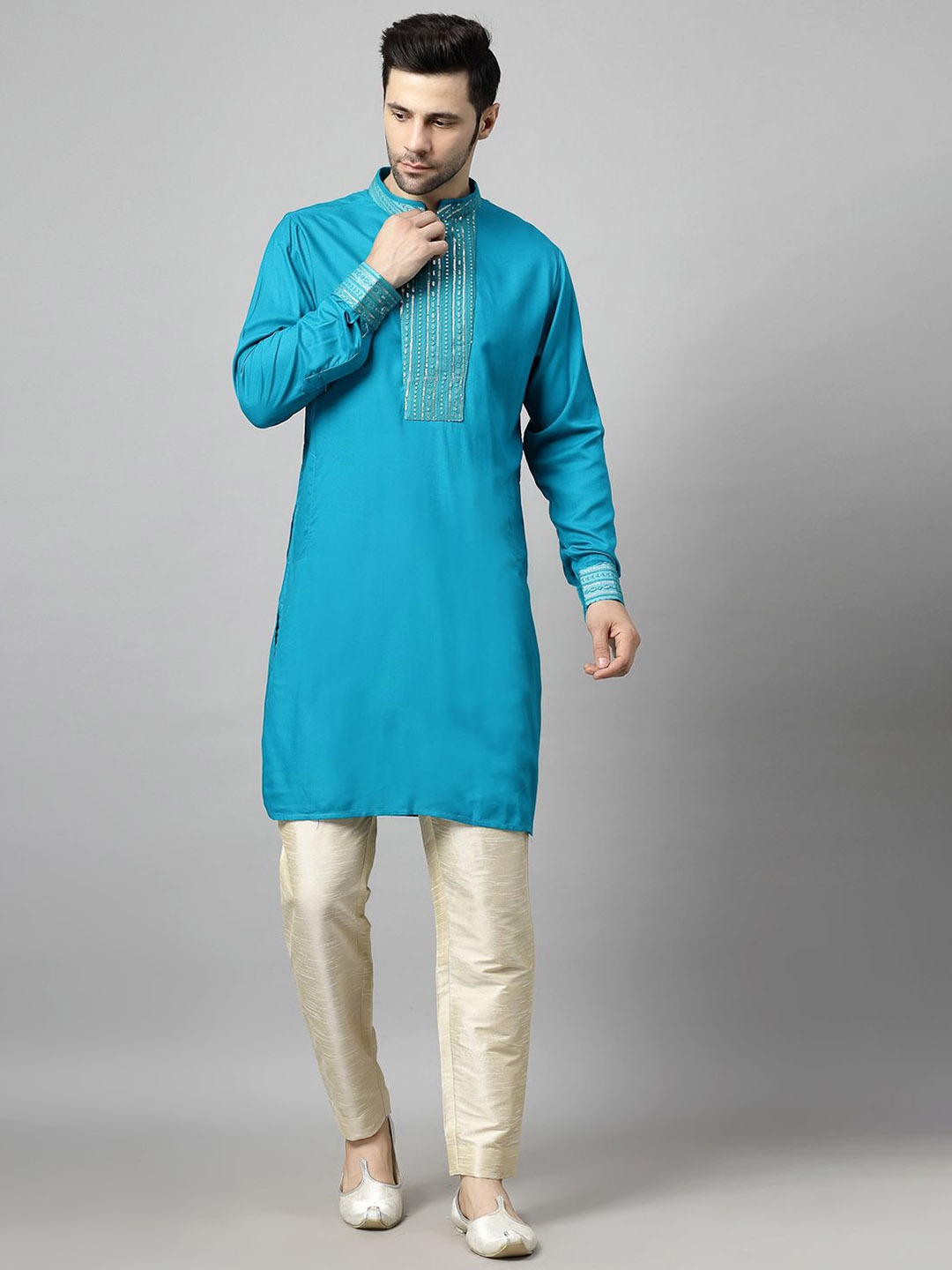 

Utsav Fashion Yoke Design Sequinned Mandarin Collar Straight Kurta with Trousers, Turquoise blue