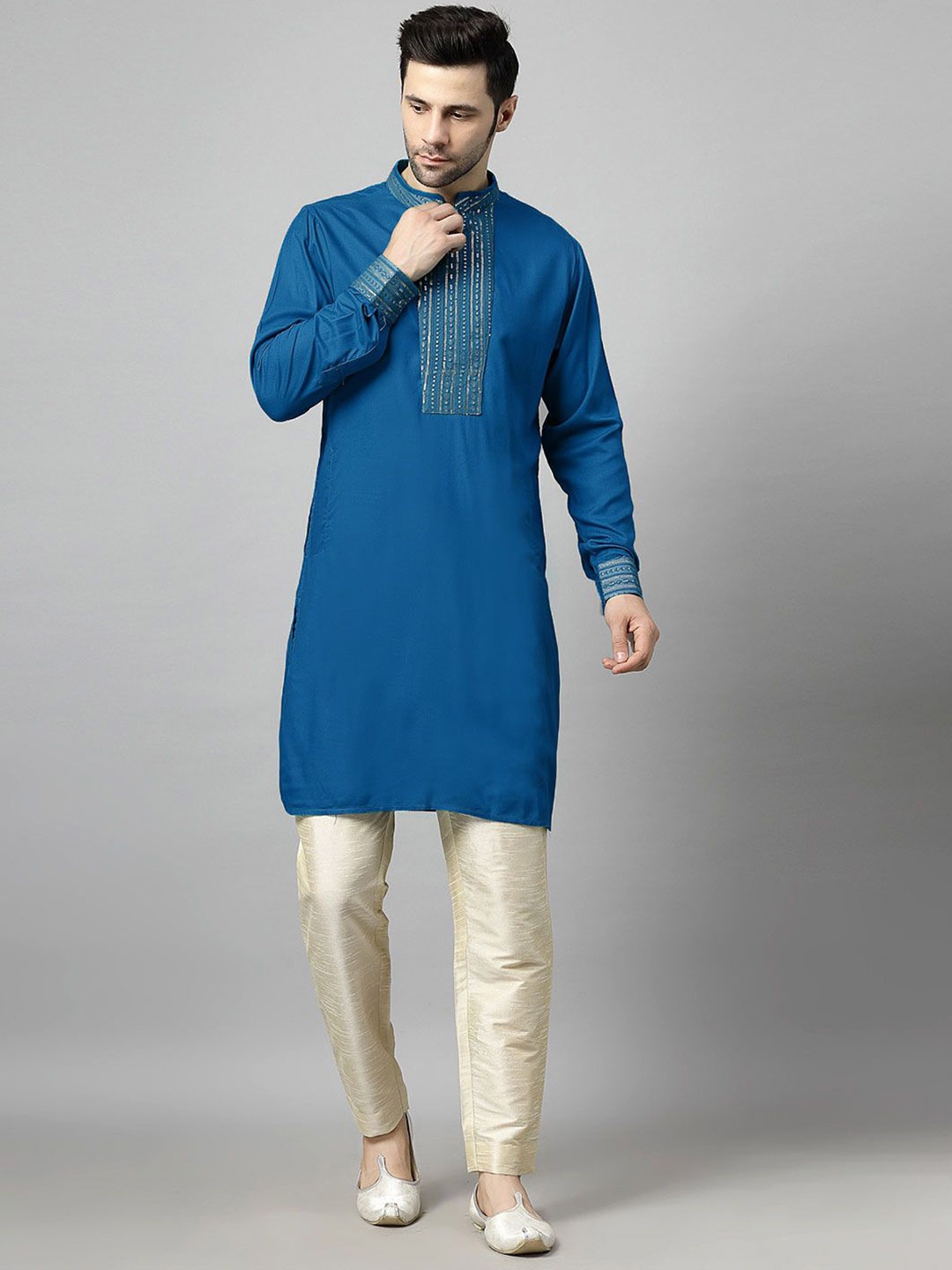 

Utsav Fashion Yoke Design Sequinned Mandarin Collar Straight Kurta with Trousers, Blue