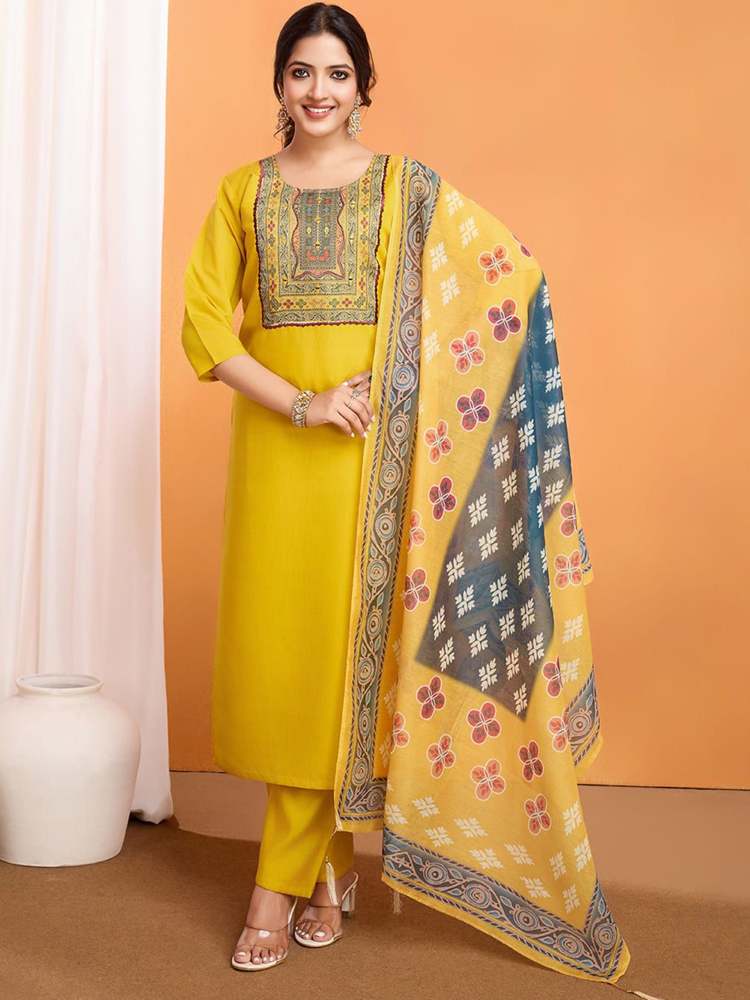 

Shriji fashion Ethnic Motifs Printed Mirror Work Pure Silk Kurta With Trousers & Dupatta, Yellow