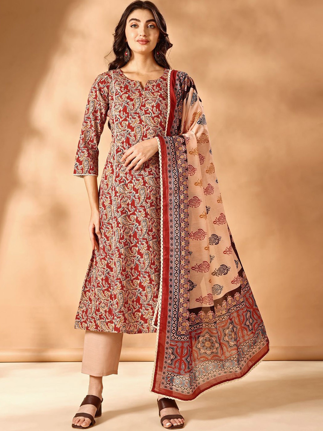 

Anouk Paisley Printed Notch Neck Pure Cotton A-Line Kurta With Trousers And Dupatta, Rust