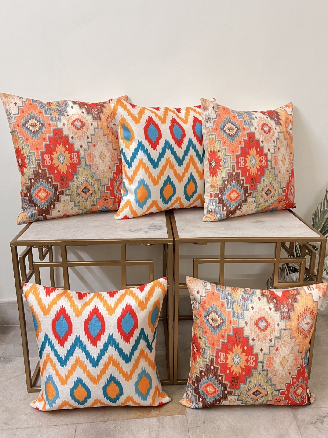 

DIHIKA Orange & Red 5 Pieces Ethnic Motifs Printed Jute Square Cushion Covers