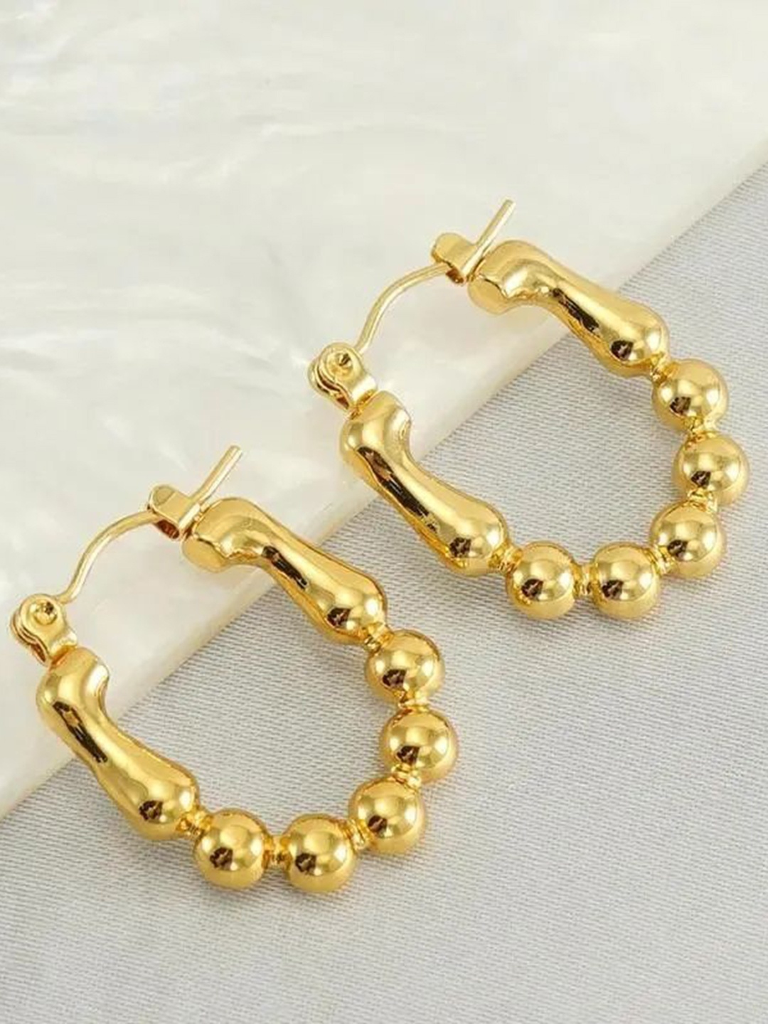 

Palli Creation Gold Plated Contemporary Hoop Earrings