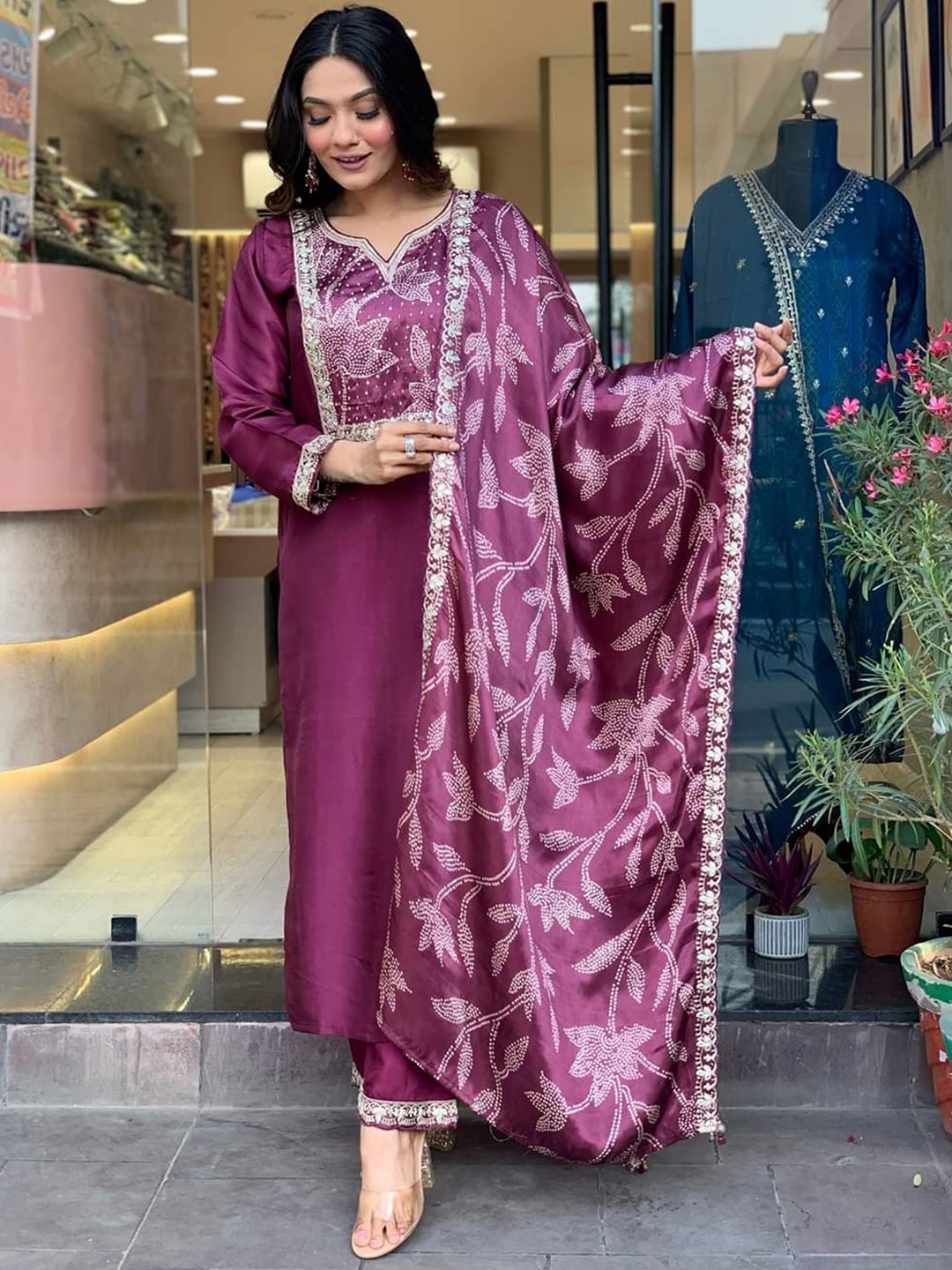 

KALINI Floral Printed Gotta Patti Chanderi Silk Straight Kurta with Trousers And Dupatta, Purple