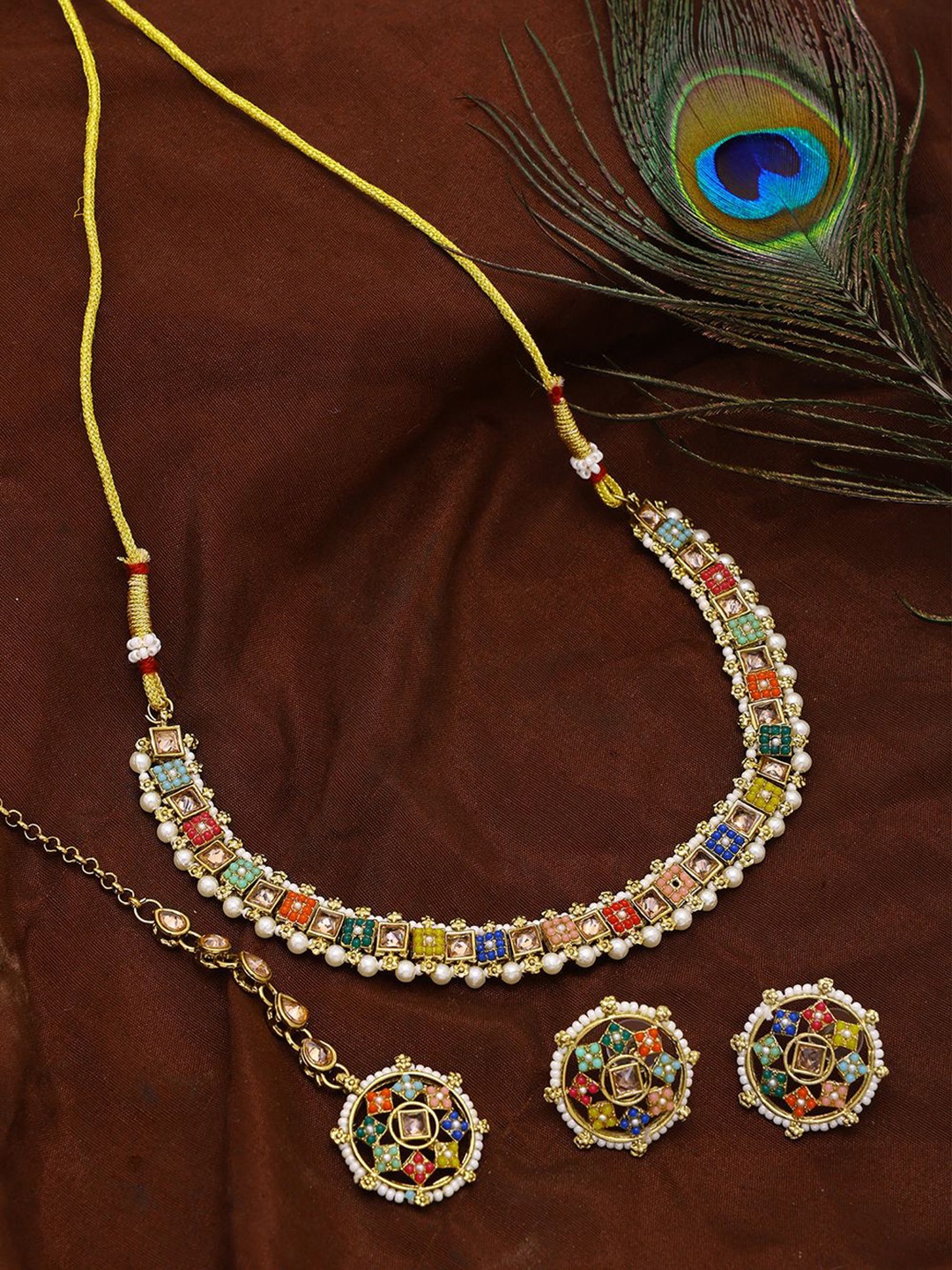

Exotic India Multicolor Stone Choker with Earrings and Mangtika Set, Gold
