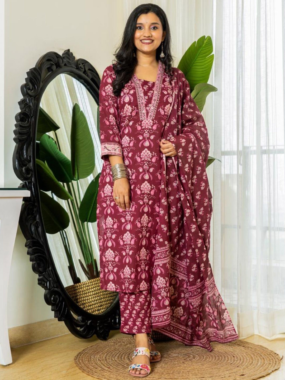 

NAINVISH Floral Printed V-Neck Straight Kurta With Trousers And Dupatta, Maroon