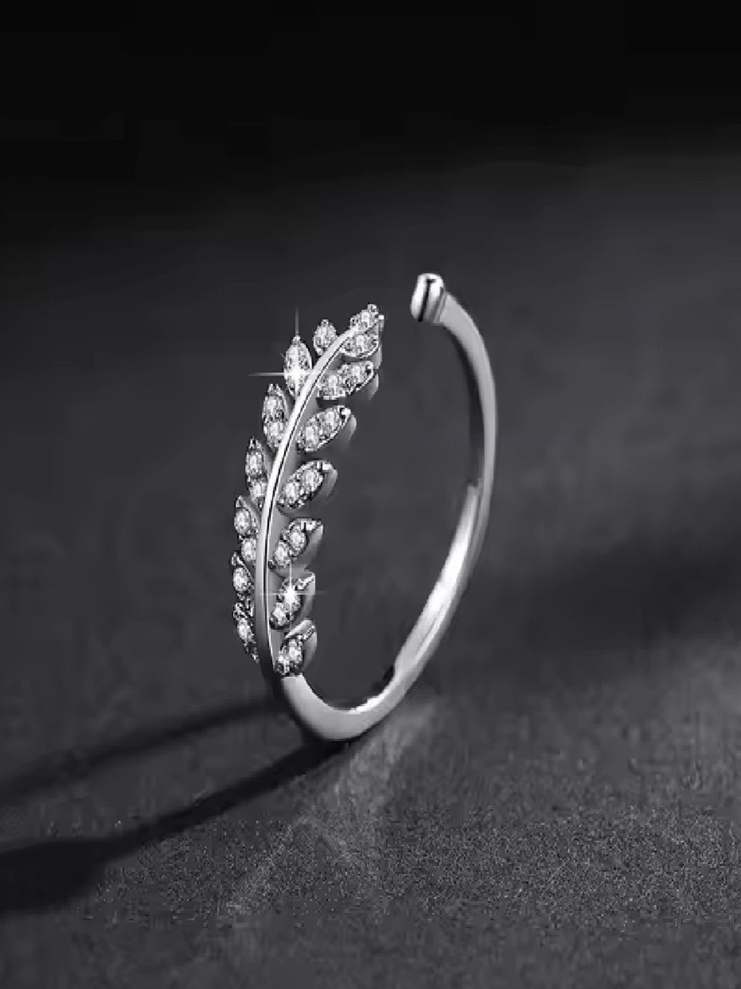 

RUHI COLLECTION Platinum Plated Stainless Steel AD Studded Leaf Adjustable Finger Ring, Silver