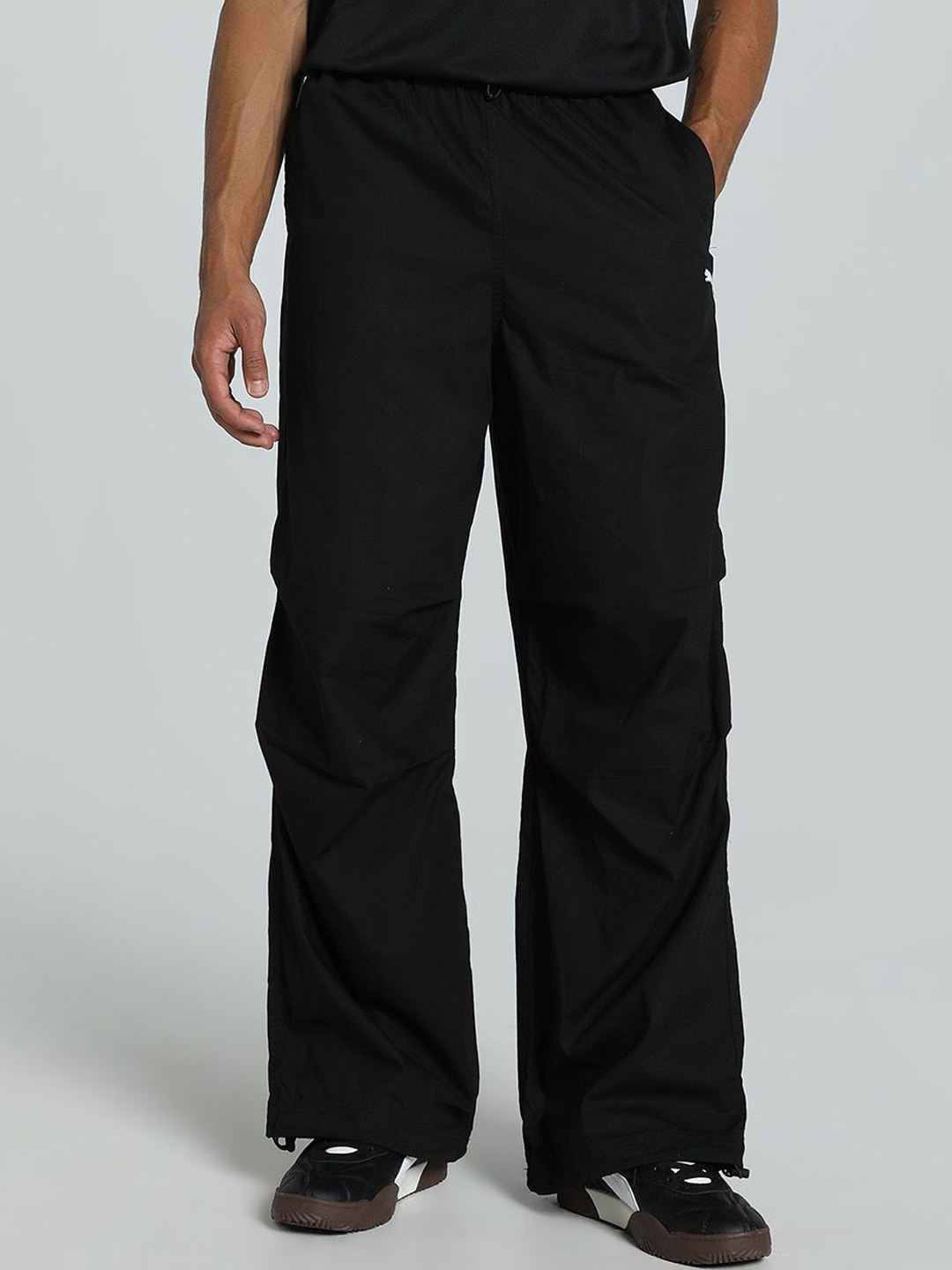 

Puma Future. Puma. Archive Unisex Relaxed Fit Cotton Track Pants, Black
