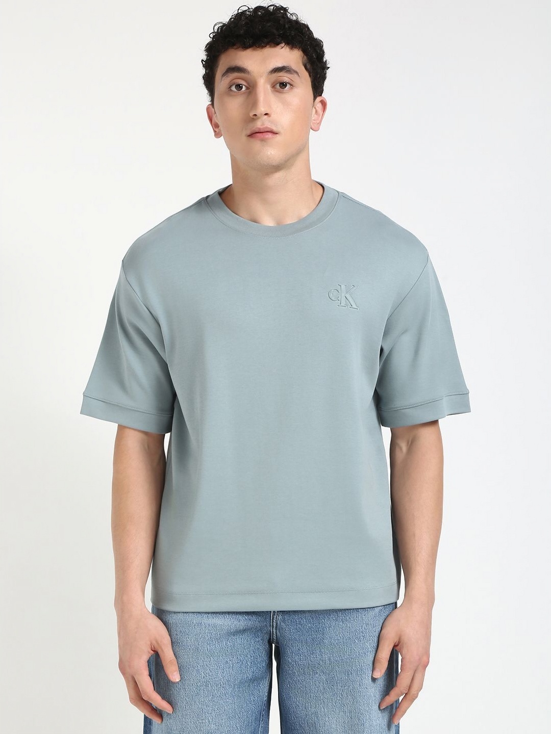 

Calvin Klein Jeans Men Drop-Shoulder Sleeves Pockets T-shirt, Blue