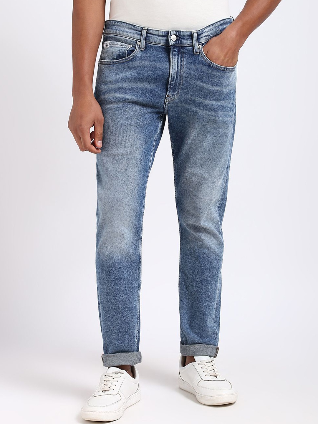 

Calvin Klein Jeans Men Slim Fit Low Distress Heavy Fade Jeans, Blue