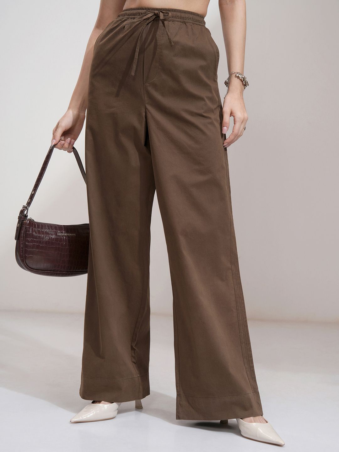

Tokyo Talkies Women Solid Elasticated Waist Straight FIt Casual Pants, Brown