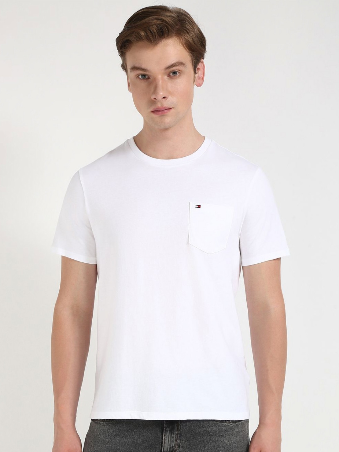 

Tommy Hilfiger Men Solid Round Neck Cotton T-shirt, White