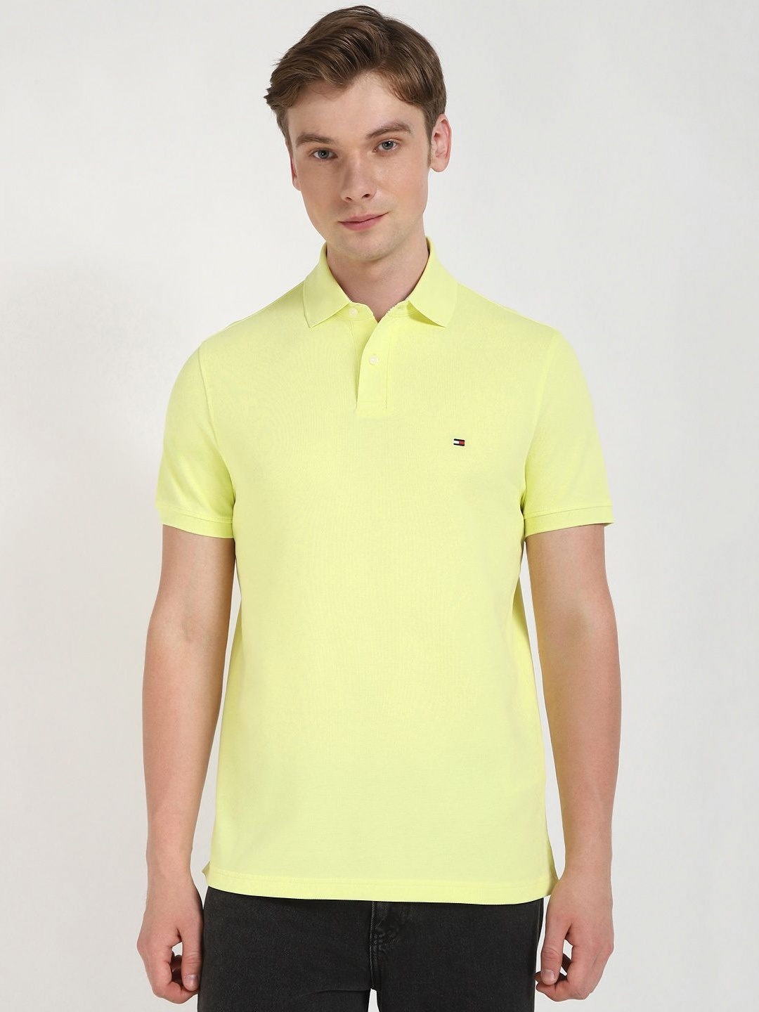 

Tommy Hilfiger Men Solid Polo Collar Cotton T-shirt, Yellow