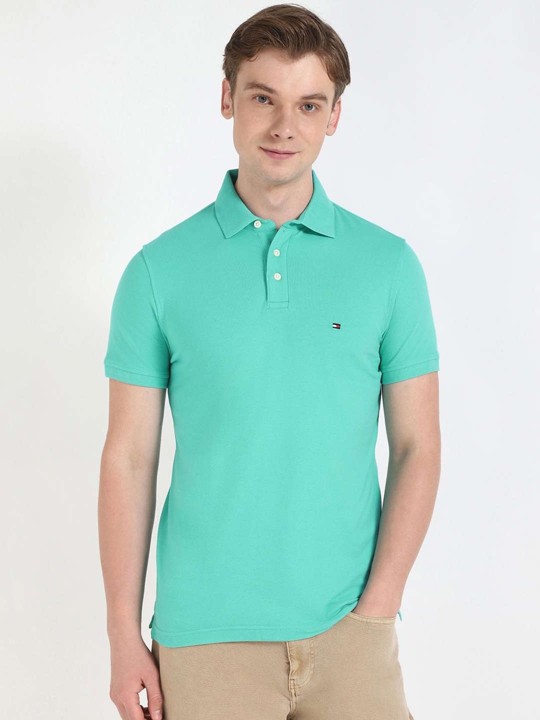 

Tommy Hilfiger Men Solid Polo Collar Cotton Slim Fit T-shirt, Sea green