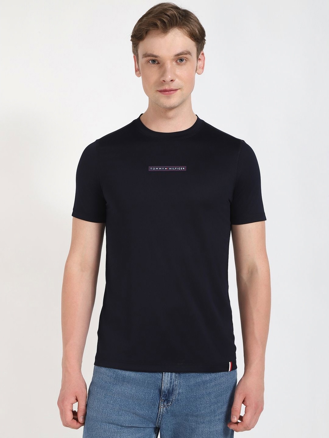 

Tommy Hilfiger Men Solid Round Neck Cotton T-shirt, Black