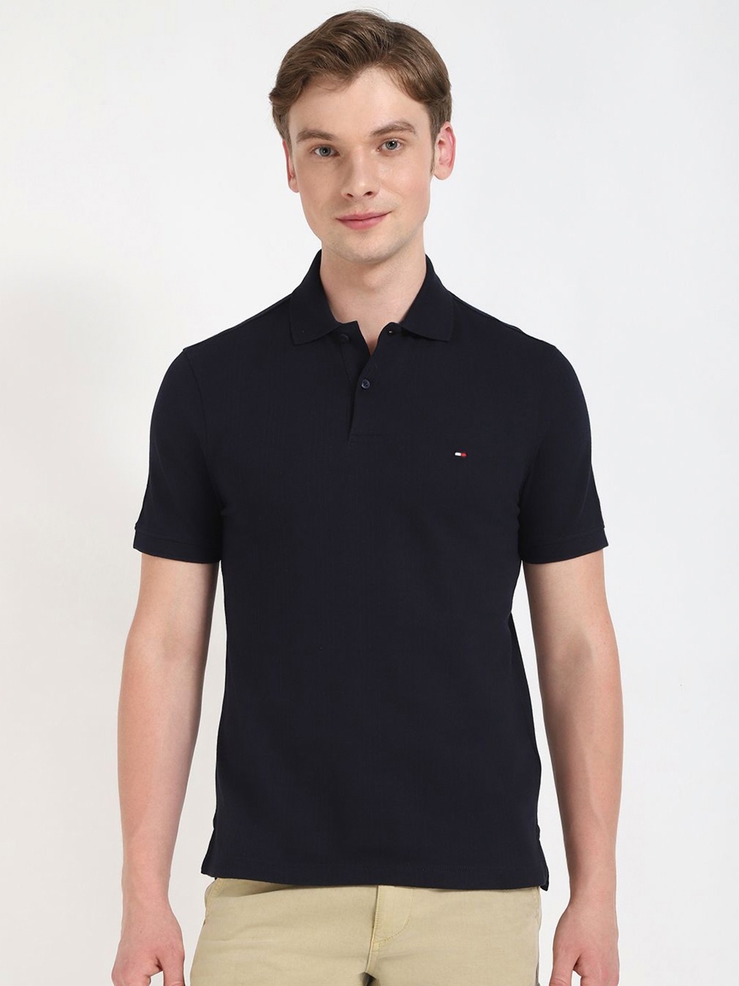 

Tommy Hilfiger Men Solid Polo Collar Cotton T-shirt, Black