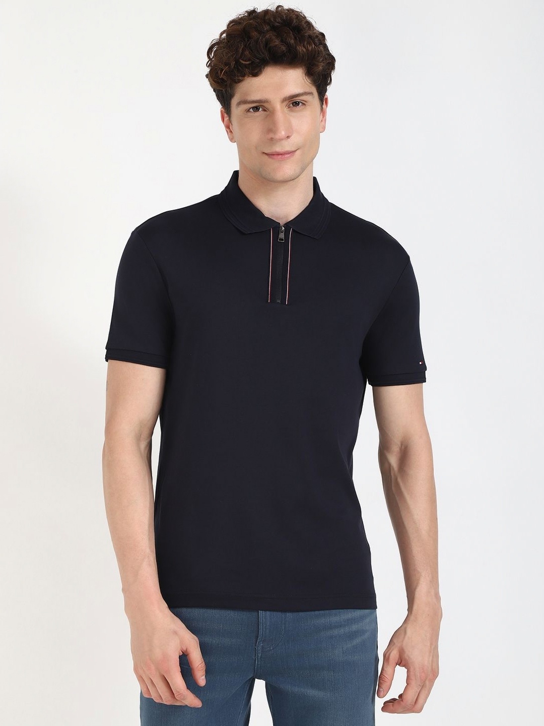 

Tommy Hilfiger Men Solid Polo Collar Cotton T-shirt, Black