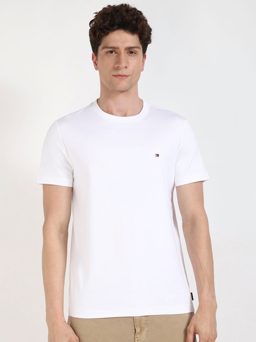

Tommy Hilfiger Men Solid Round Neck Cotton T-shirt, White