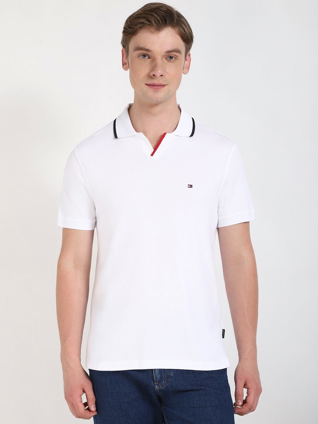 

Tommy Hilfiger Men Solid Polo Collar Cotton T-shirt, White