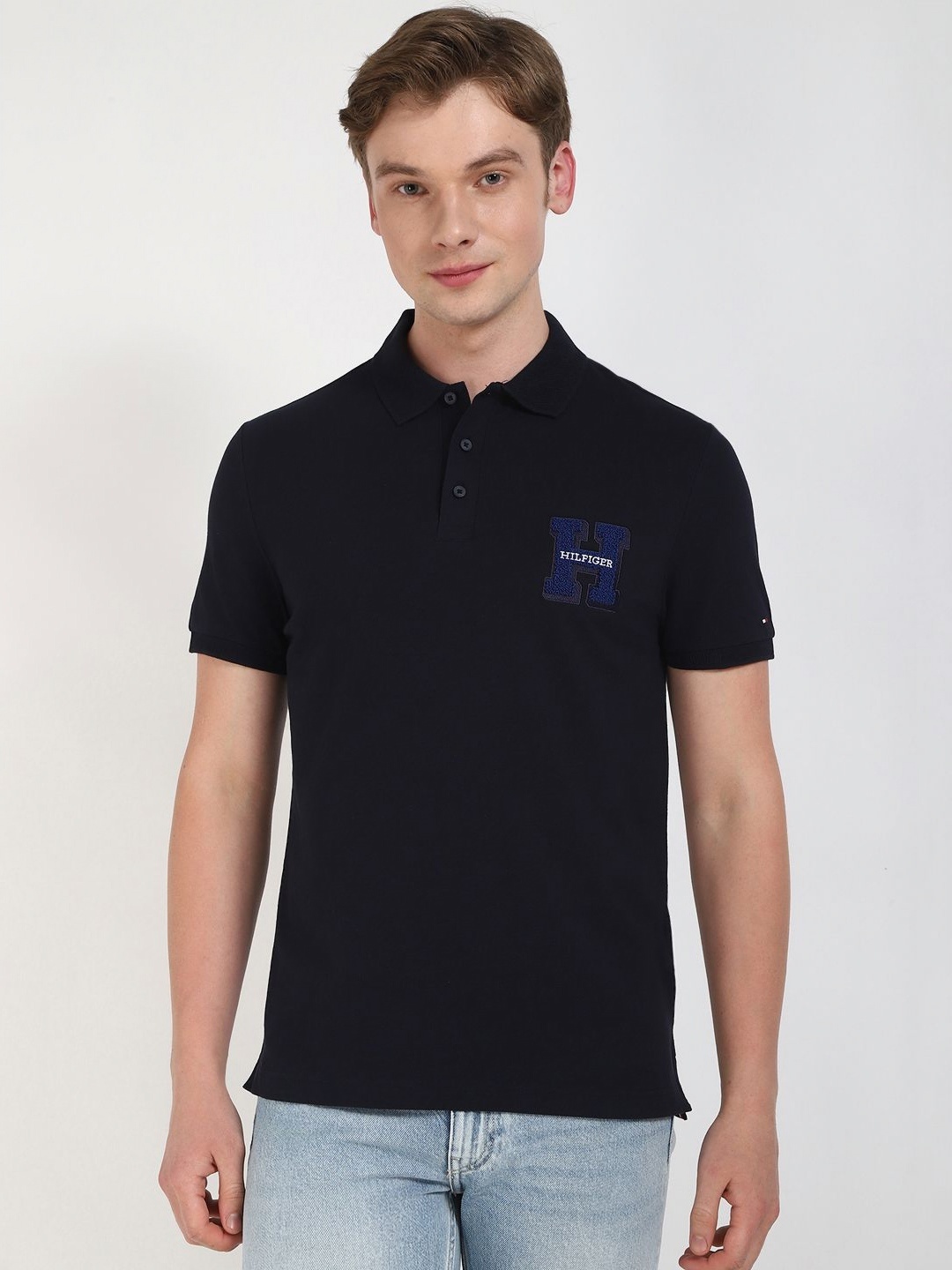 

Tommy Hilfiger Men Solid Polo Collar Cotton T-shirt, Black