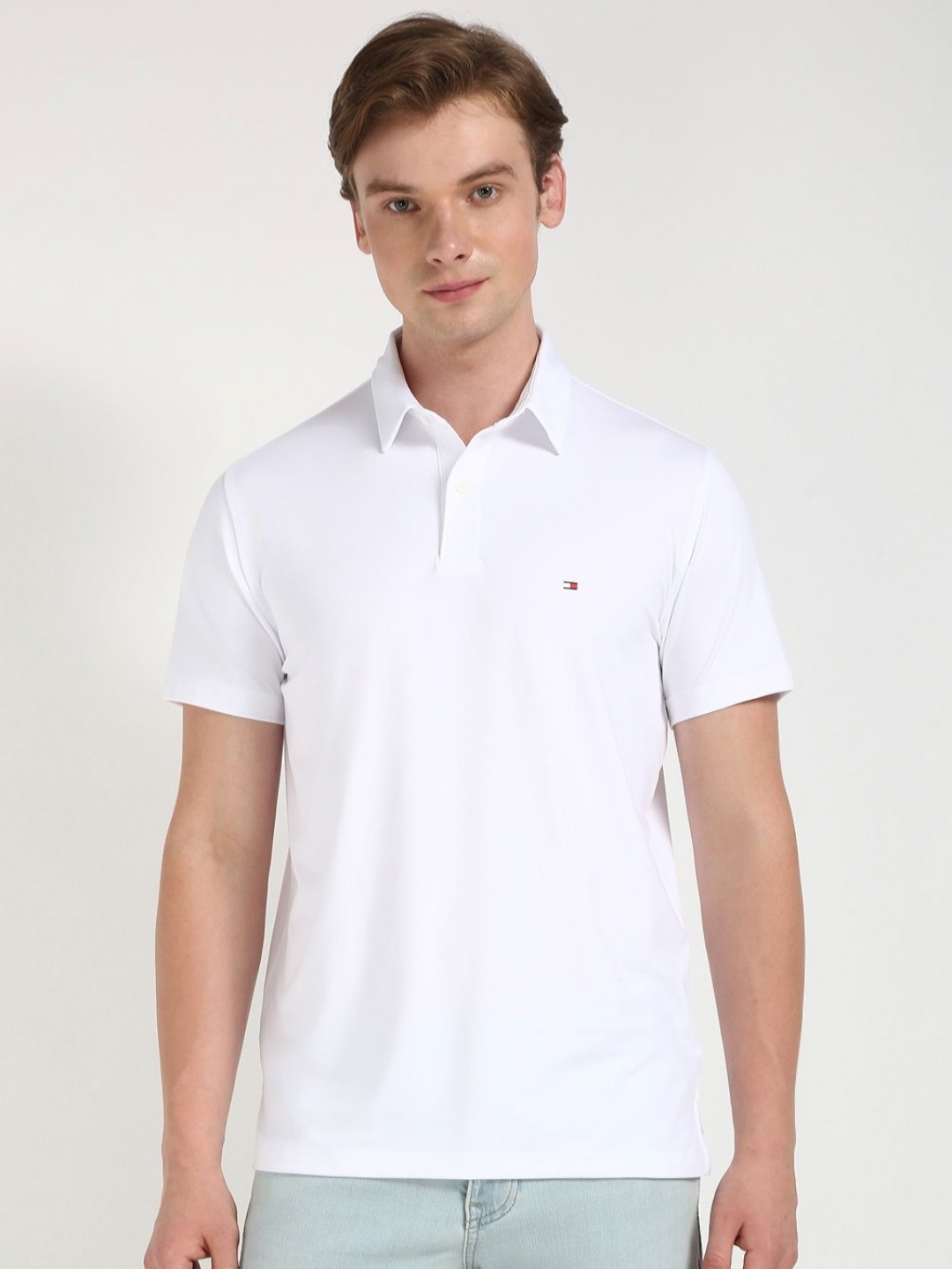 

Tommy Hilfiger Men Solid Polo Collar Cotton T-shirt, White