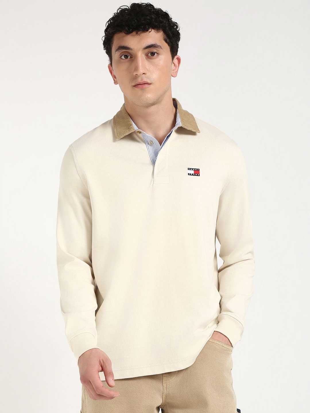 

Tommy Hilfiger Men Solid Polo Collar Cotton Relaxed Fit T-shirt, Beige