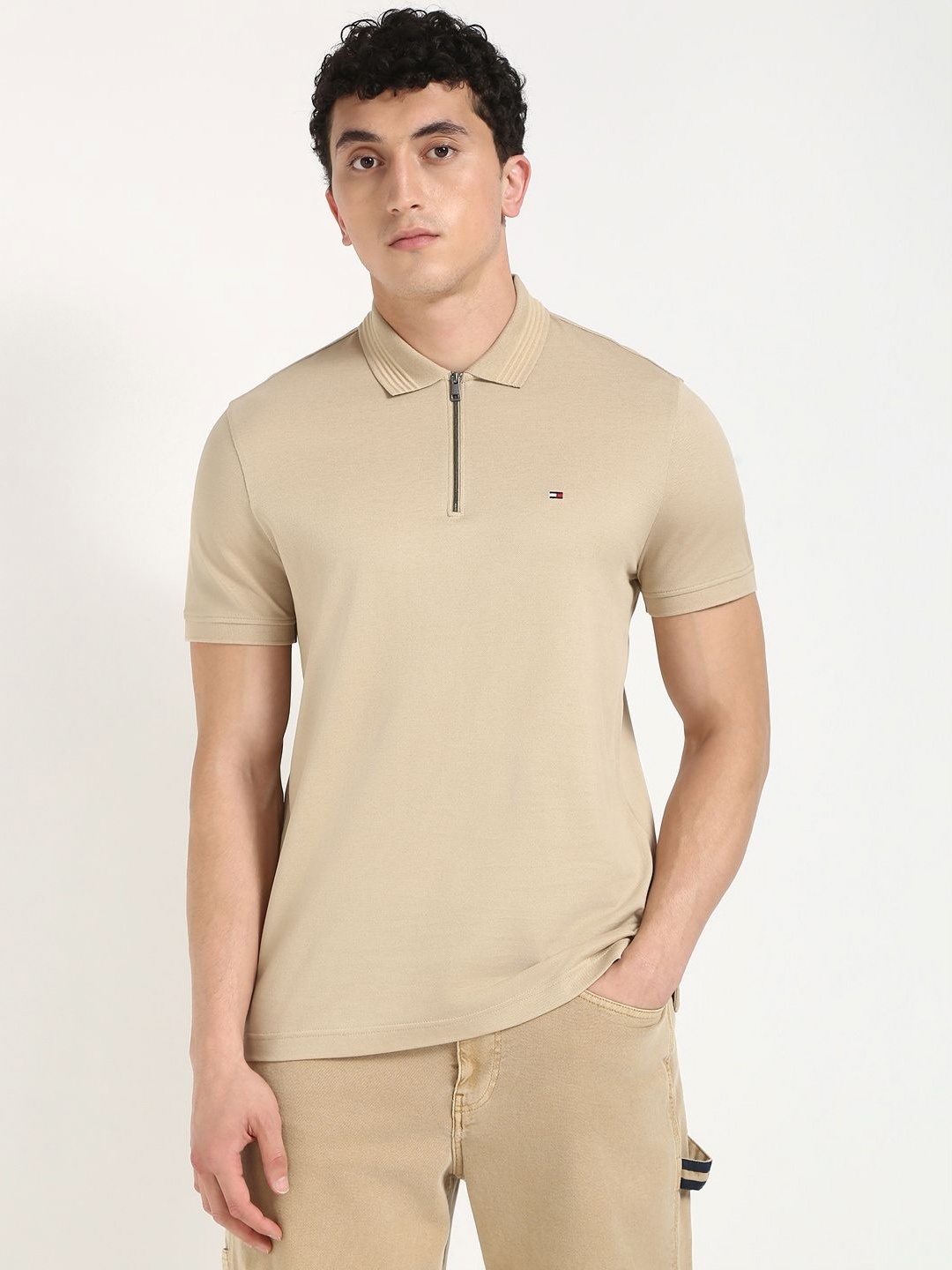 

Tommy Hilfiger Men Solid Polo Collar Cotton T-shirt, Beige