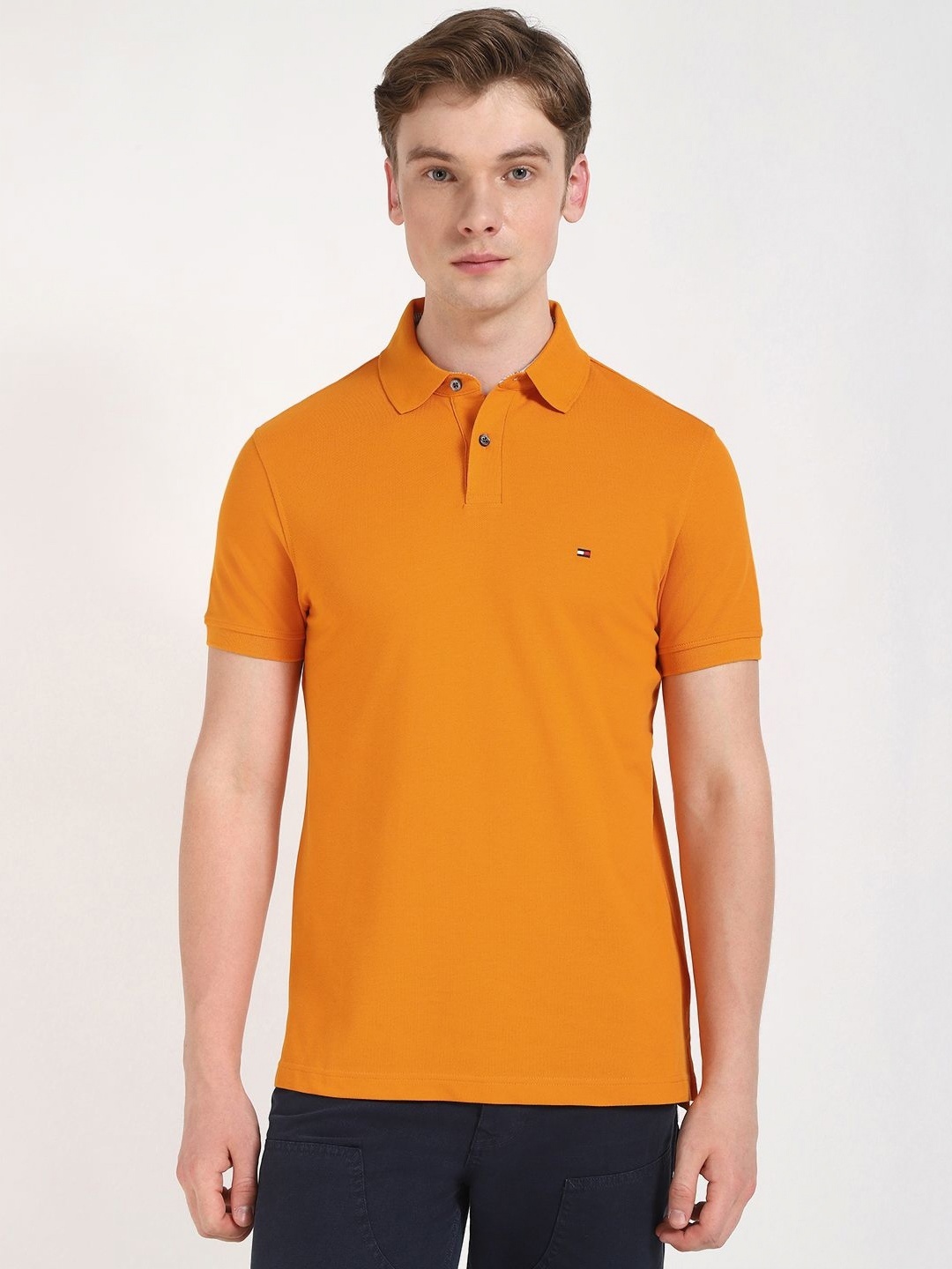 

Tommy Hilfiger Men Solid Polo Collar Cotton T-shirt, Orange