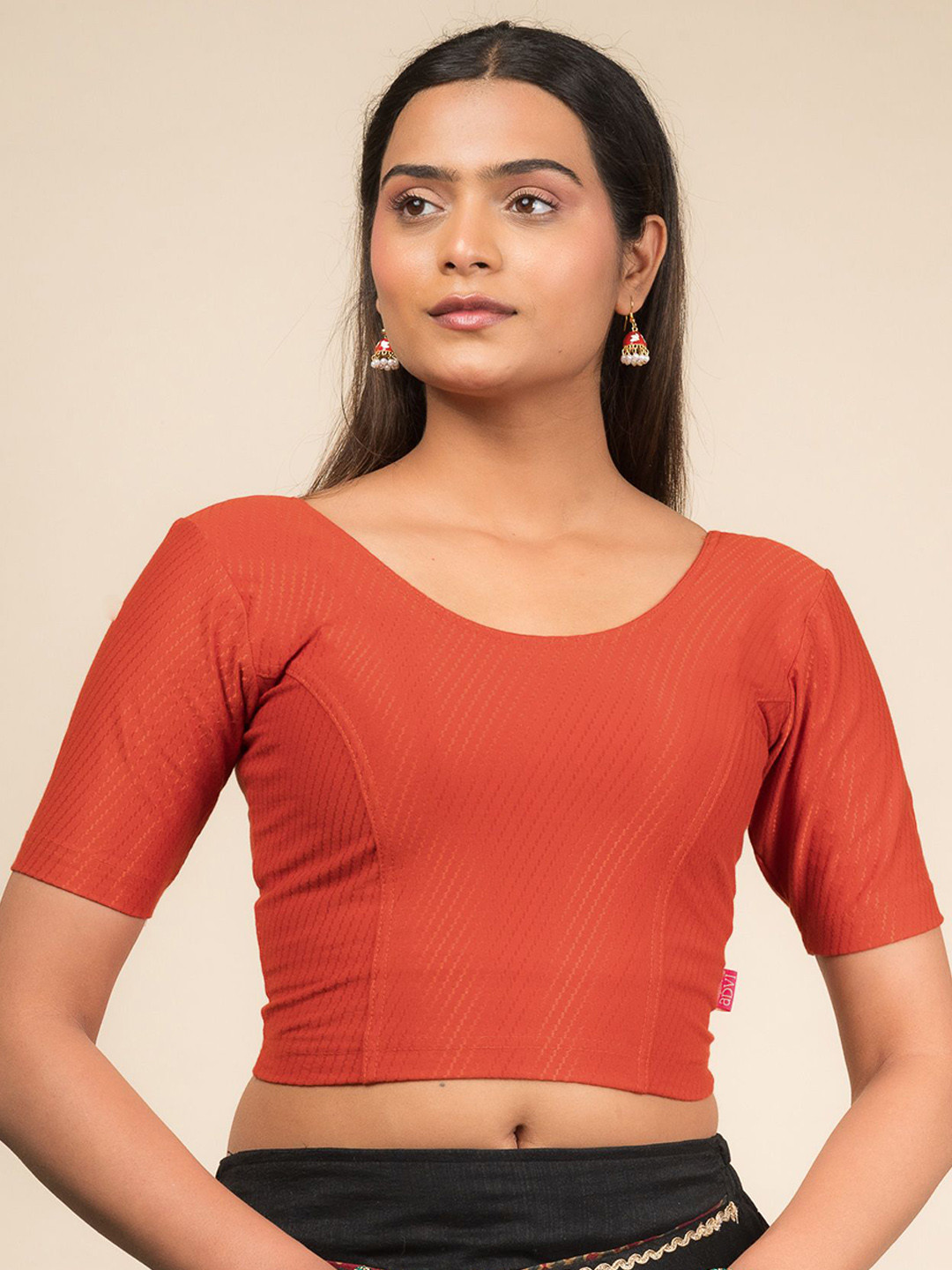

Bindigasm's Advi Self Design Cotton Stretchable Slip On Saree Blouse, Rust