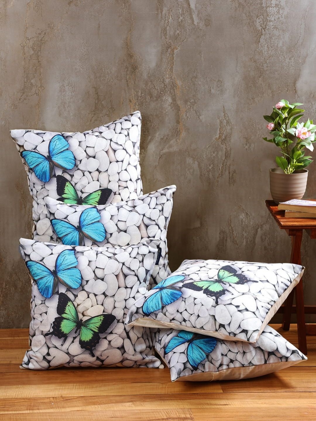 

Aura White & Blue 5 Pieces Butterfly Printed Jute Cotton Square Cushion Covers