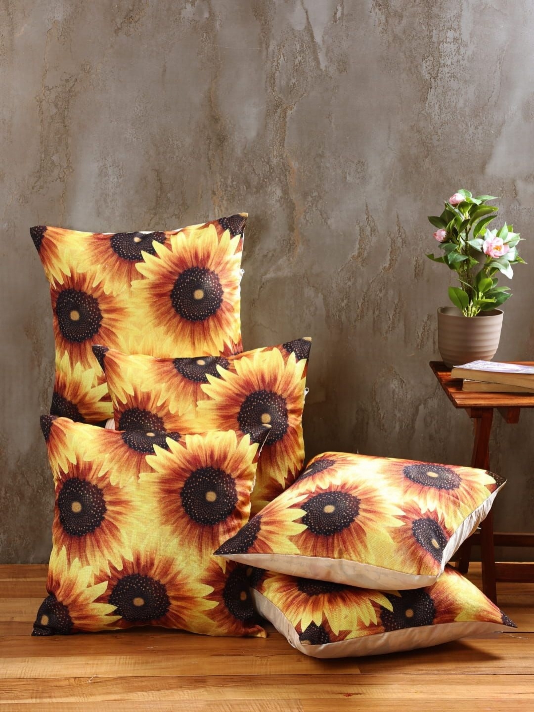 

Aura Yellow & Brown 5 Pieces Floral Printed Jute Cotton Square Cushion Covers
