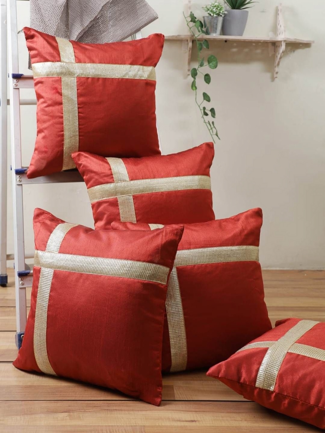 

Aura Maroon & Gold-Toned 5 Pieces Geometric Printed Square Cushion Covers